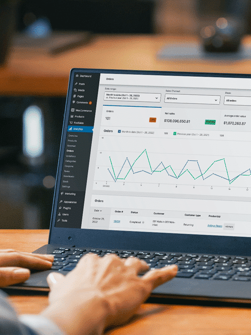 Home 9 Person Viewing Woocommerce Analytics On A Laptop Computer.