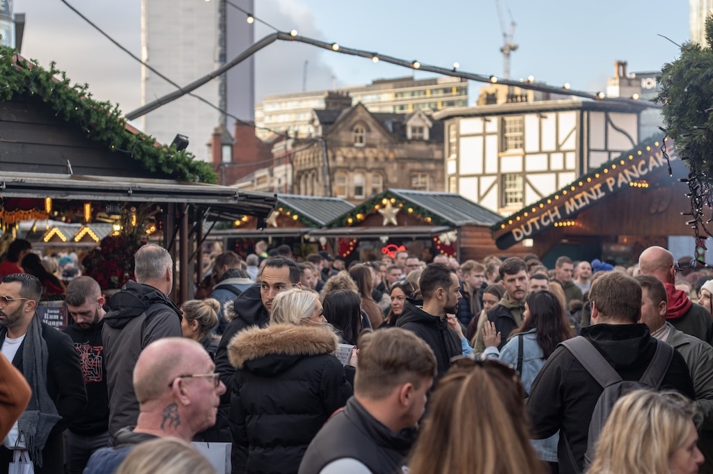 Extremely Busy Crowds At A Christmas Market.