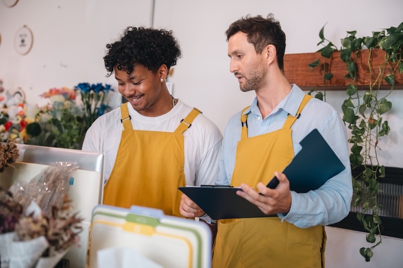 Woocommerce Black Friday Pos Checklist (2026) 4 Florist Shop Worker Team Planning Bouquet Order